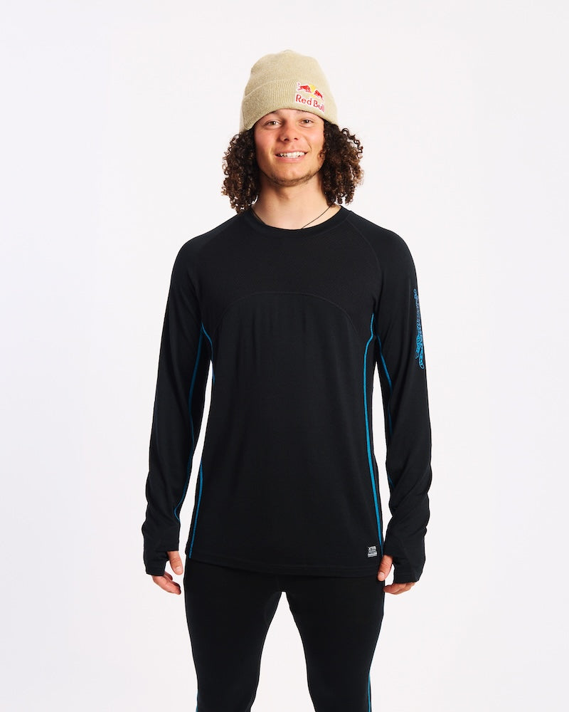 Person wearing a black long-sleeve shirt and beige beanie on a white background Valentino XTM merino black wool thermal 